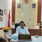 Kades Muara Beliti Baru, Zaipul Basri saat diwawancarai wartawan Musirawas.com di kantornya, Kamis (1/10/2026).